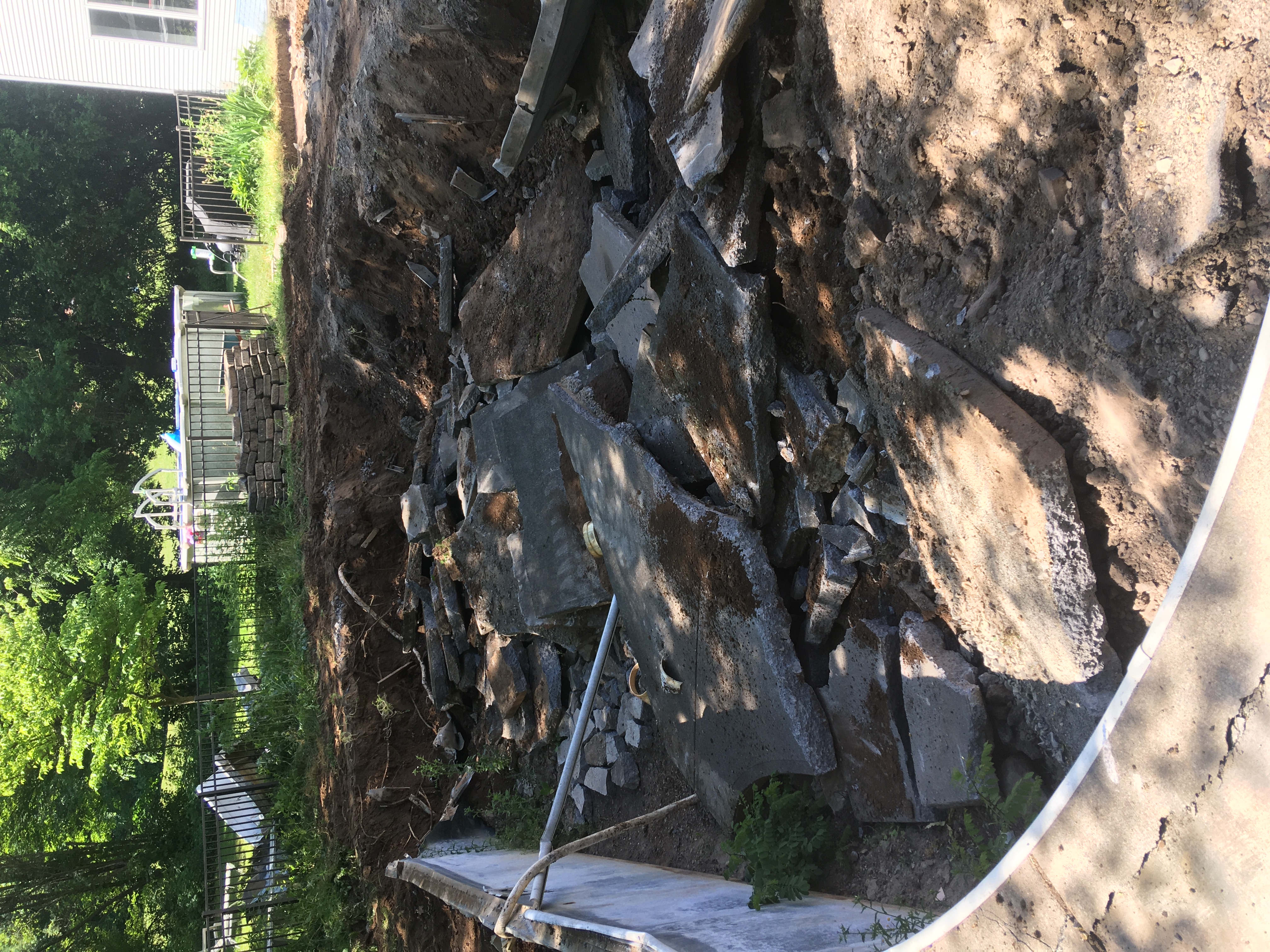 Backyard before swimming pool demolition and removal